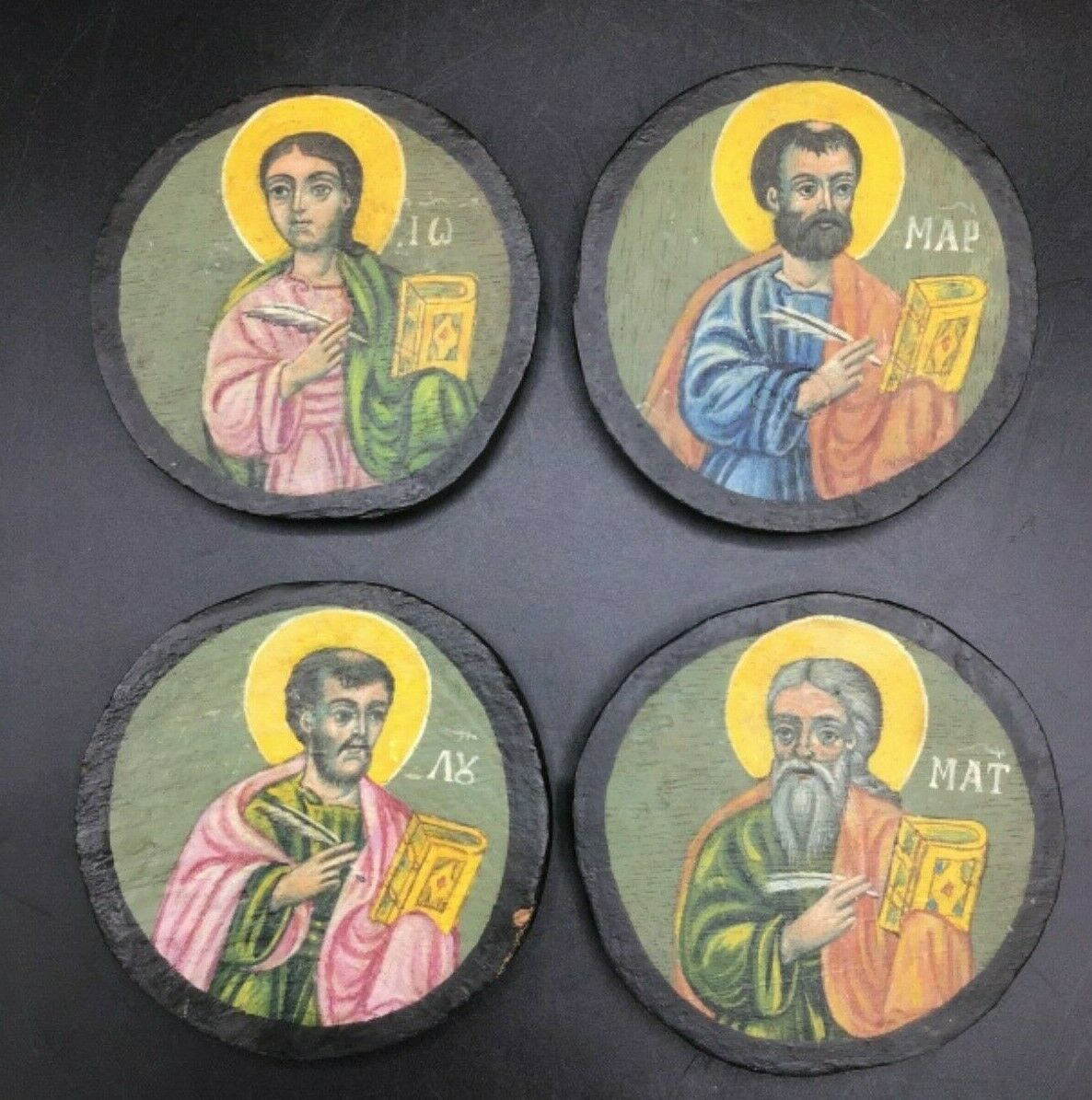 Four antique Greek Orthodox circular icons of the evangelists